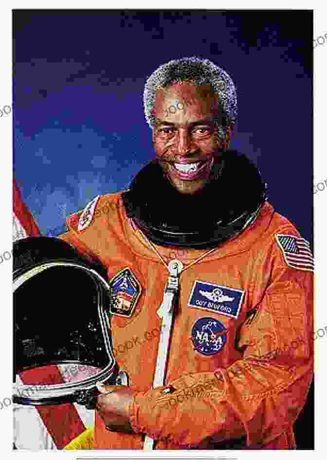 A Photo Of Guion S. Bluford Jr., The First African American Astronaut To Fly In Space, Wearing A Blue NASA Jumpsuit And Smiling. Alone (Bluford 23) Smokey Moment