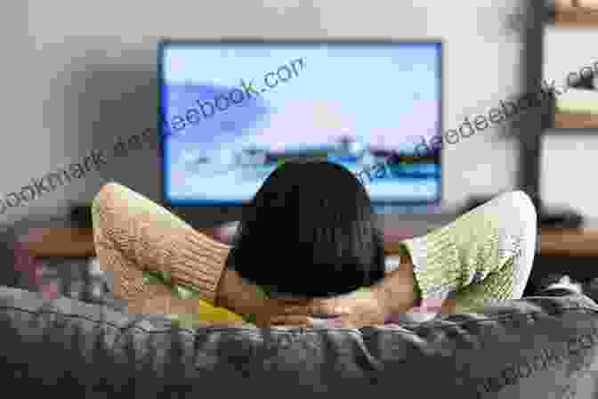 A Photograph Of A Person Watching Television. 555 Timer IC Circuit Magic S: Four Way Traffic Lights Glimmering Police Lights Metal Detector Television Remote Control And Motor Speed Control