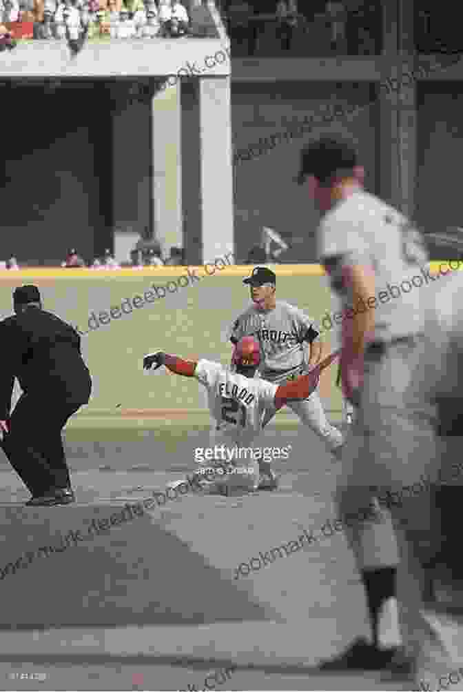 Curt Flood Sliding Into Second Base During A St. Louis Cardinals Game. A Well Paid Slave: Curt Flood S Fight For Free Agency In Professional Sports