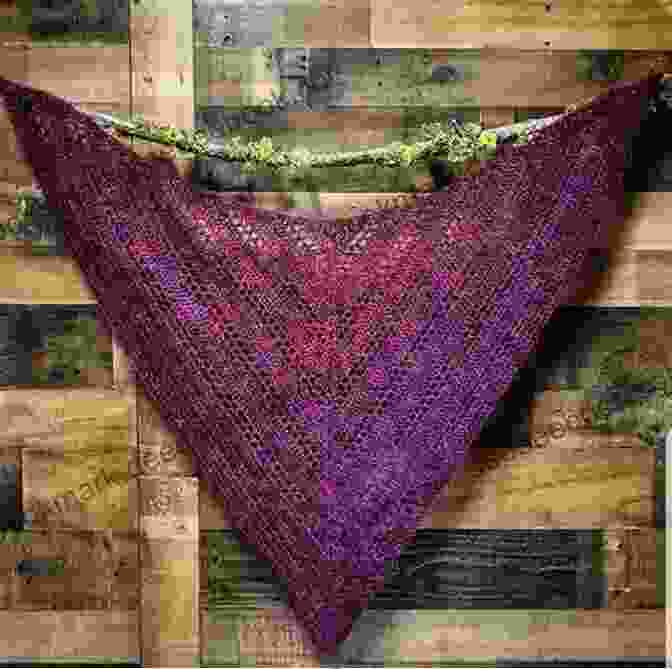 Mountain Peaks Shawl Crocheted In A Gradient Yarn, Showcasing A Stunning Triangular Design With Intricate Lacework. 10 Scarves And Cowls: To Knit And Crochet