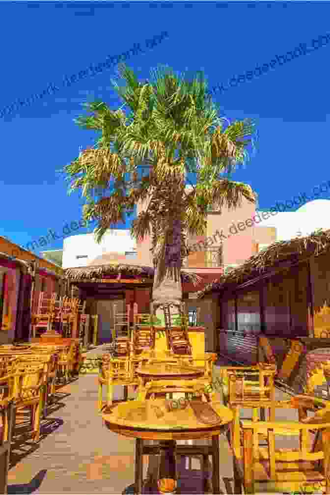 Vibrant Atmosphere Of A Local Taverna In Kalli Dakos, With Outdoor Seating And Traditional Greek Music Homes (Picture This) Kalli Dakos